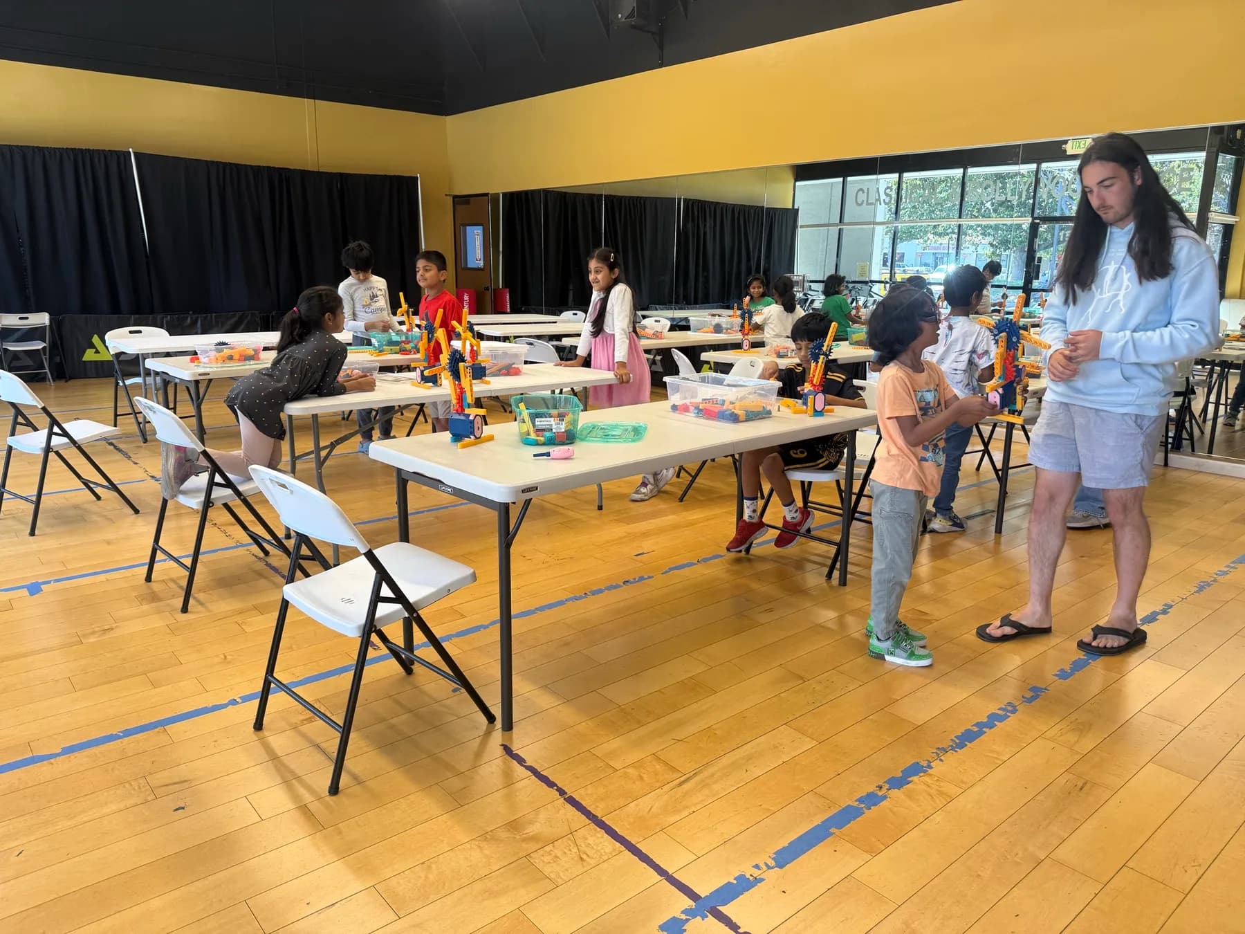 Children learning and building together during a hands-on activity